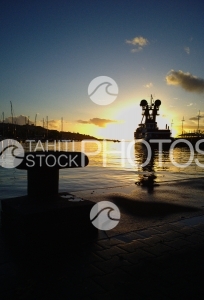 Sunset And Boats In Port Of Tahiti