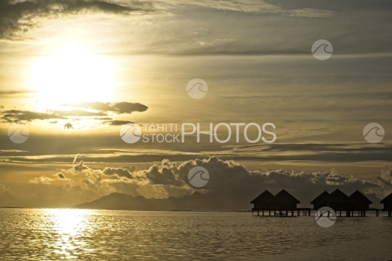 Luxury overwater bungalows in the lagoon and sunset, Moorea in the backyard