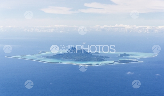 Island of Bora Bora and ocean, aerial view