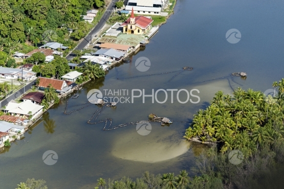 Huahine, aerial view of fisher house in the river