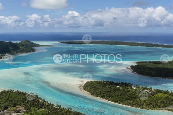 Aerial view of the lagoon and turquoise water of Maupiti