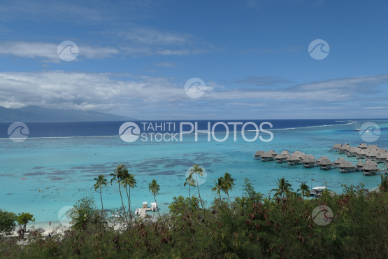 Coast line of Moorea, view on the lagoon and a luxurious hotel
