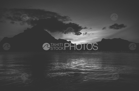 Island and lagoon of Bora Bora at the sunset, shot in black and white