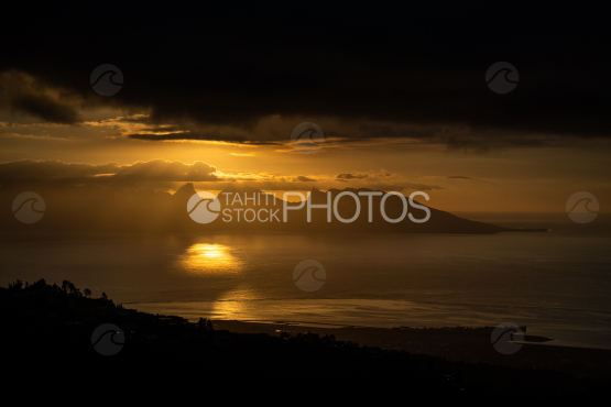 Moorea, sunset and cloudy sky, shot from Tahiti