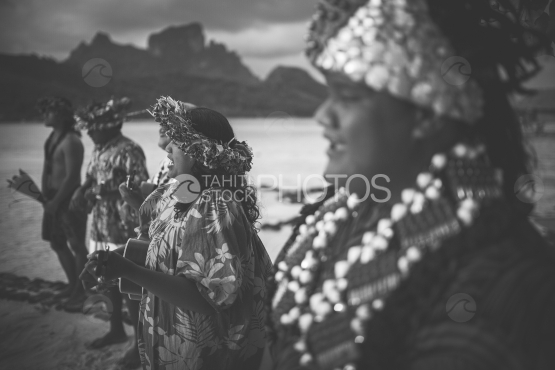 Bora Bora, dancers with traditional costume on the beach, black and white