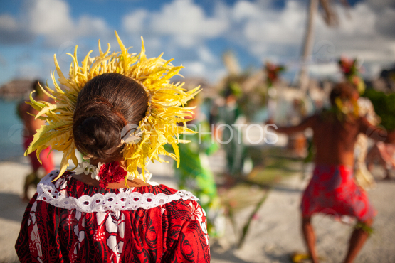 Traditional polynesian wedding, dancers group dancing on the beach, Bora Bora