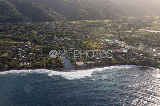Tahiti, aerial view of river and beach of Taharuu at sunrise