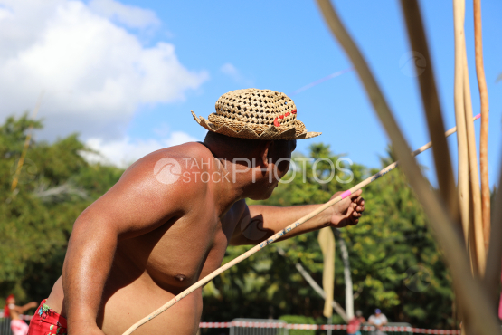 Tahiti, Polynesian man, traditional javelin throwing competition, Tuaro Maohi, Polynesia
