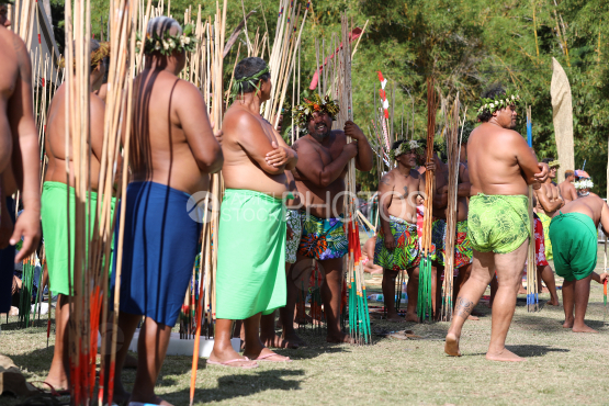 Tahiti, Polynesian men with colorful pareos, traditional javelin throwing competition, Tuaro Maohi, Polynesia