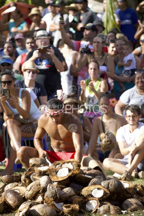 Traditional polynesian sports contest, Coconut shelling, Tahiti, French Polynesia