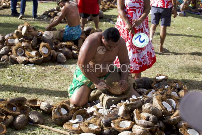 Traditional polynesian sports contest, Coconut shelling, Tahiti, French Polynesia